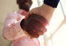 Tax preparer and client shaking hands